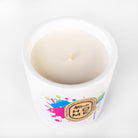 Artitude Home scented candle in white, designed to create a peaceful retreat with cardamom, sandalwood, and creamy vanilla.